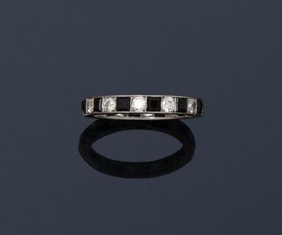 CARTIER CARTIER

American platinum wedding band decorated with old cut and half cut...