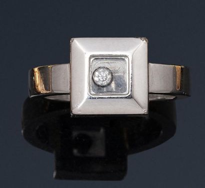 CHOPARD CHOPARD

Happy diamonds" ring in 18K (750) white gold, the square bezel with...
