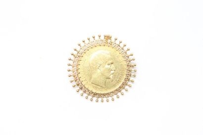 null 18K (750) yellow gold brooch with a radiating motif enclosing a 100 franc Napoleon...