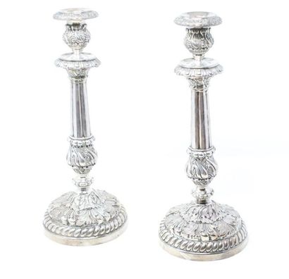 null Pair of silver torches (950) resting on a round base edged with twisted gadroons...