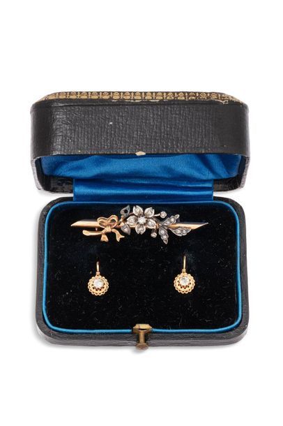 null Set consisting of an 18K (750) rose gold and silver brooch decorated with antique...