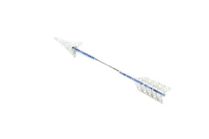 null PL5

Platinum "arrow" jabot pin adorned with a line of calibrated sapphires,...