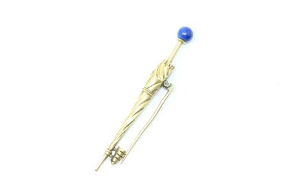 null Umbrella brooch in 18K (750) yellow gold, the handle decorated with a lapis...