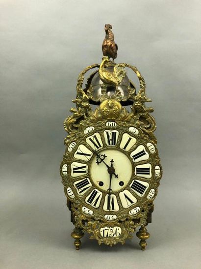 null Wooden and gilt bronze cartel with an enamelled cartridge dial encased in a...