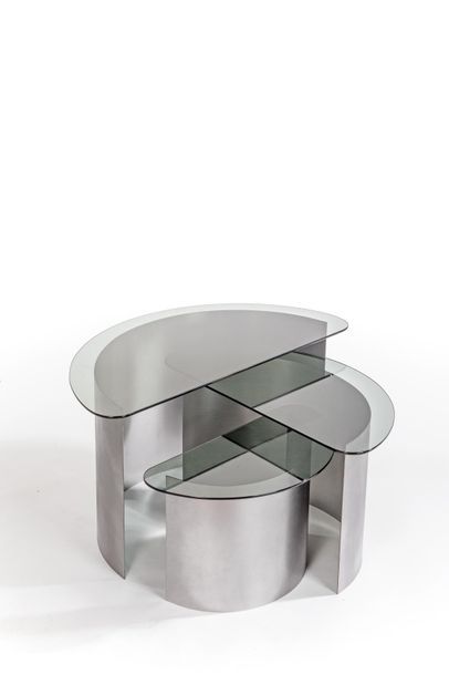 null FRENCH WORK

Nesting Tables Brushed steel and smoked glass, circa 1970

Height...