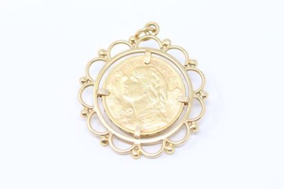 null Gold coin of 20 francs Vreneli (1914 B) mounted as a pendant, openwork setting...