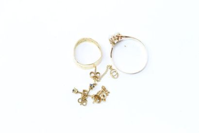 null 18k (750) yellow gold set including two pairs of ear studs, an 18k (750) yellow...