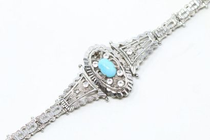 null Bracelet articulé en or gris 18k (750) le centre orné d'une turquoise épaulée...