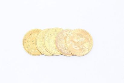 null Set of four yellow gold coins: 

- Three 20 franc coins Napoleon III bareheaded...