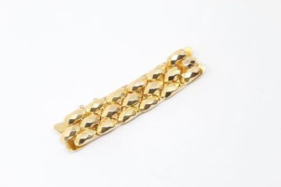 null Bracelet en or jaune 18k (750) à maillon losangique facetté.

Tour de poignet...