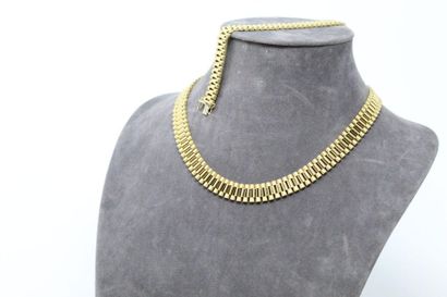 null Demi parure en or jaune 18k (750) à maille articulée composé d'un collier et...