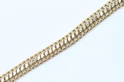 null Bracelet en or jaune 18k (750) à maille tressée. 

Tour de poignet : 19.5 cm....