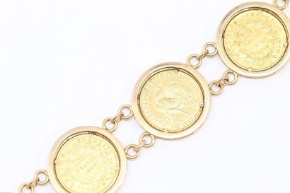 null Bracelet en or jaune 18K (750) formé de 6 pièces 20 Francs or au coq et Napoléon...