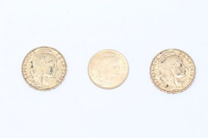 null Trois pièces en or type Coq : 10 francs 1911 (TTB) et 20 francs 1900 & 1909.

Poids...