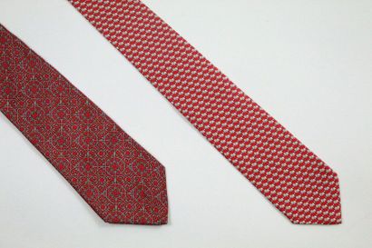 LANCEL LANCEL, SALVATORE FERRAGAMO

Lot de deux cravates à dominante rouge et motfs...