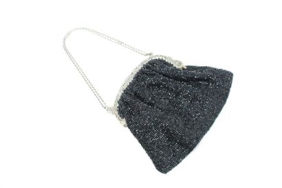 Black beaded handbag with silver frame. 

19th...