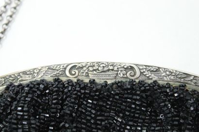 null Black beaded handbag with silver frame. 

19th century work. 

(Accidents &...