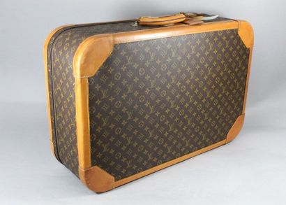 LOUIS VUITTON LOUIS VUITTON

Stratos" suitcase in Monogram canvas and natural leather,...