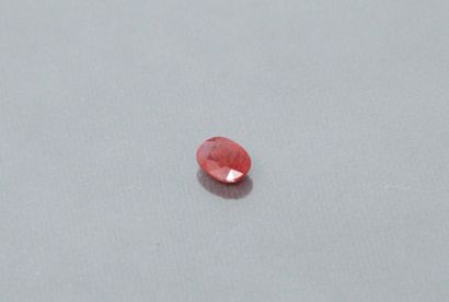 null Oval sapphire on paper. 

Probably Madagascar. 

Weight: 3.18 cts. 