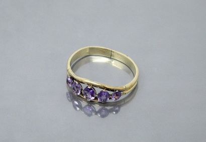 null 18k (750) yellow gold bracelet with imitation violet stones and amethysts.

Gross...