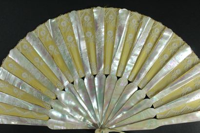 null Mother-of-pearl shelves, circa 1880

Small folded fan, the yellow satin leaf...