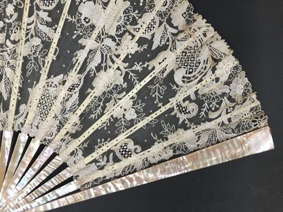 null Profusion of flowers, circa 1890

Large folded fan, needle lace leaf with flower...