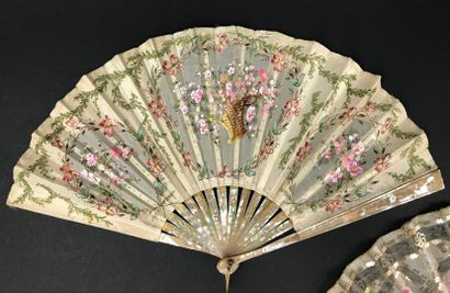 null Embroidery, circa 1920 - Two fans. 

*One, a silk leaf embroidered with a basket...