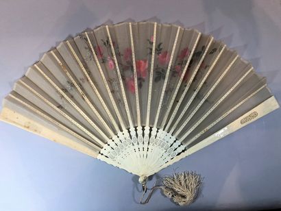 null Two fans, circa 1890

*One, a satin leaf painted with two birds among flowering...