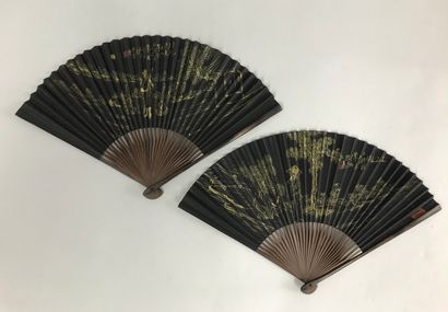 null 
Two fans, China, 20th century





Folded fans, the black paper leaves with...