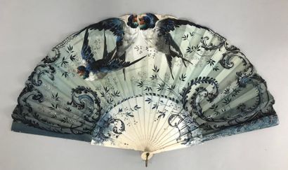null Two fans, late 19th century

*One, the black satin leaf painted with a Chinese-inspired...