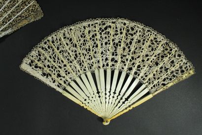 null Two fans, late 19th century

*One, the lace leaf. Ivory frame* (18th century)....