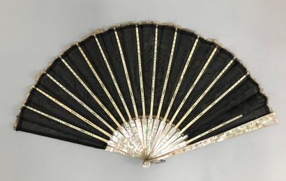 null 
Lace flowers, circa 1900-1920

Two fans

*One, the leaf in bobbin lace, with...