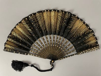 null Sequins, circa 1900-1920

Two fans

*One, the black cloth leaf sewn with golden...