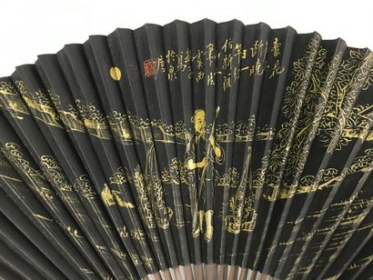 null 
Two fans, China, 20th century





Folded fans, the black paper leaves with...