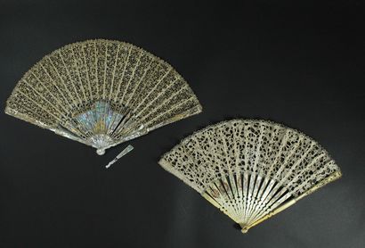 null Two fans, late 19th century

*One, the lace leaf. Ivory frame* (18th century)....