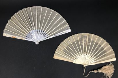 null Two fans, circa 1900

*One, the leaf embroidered with a braid of laurels in...