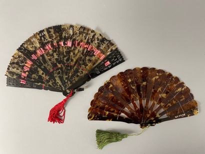 null Two brown tortoiseshell fans**. Indonesia, early 20th century