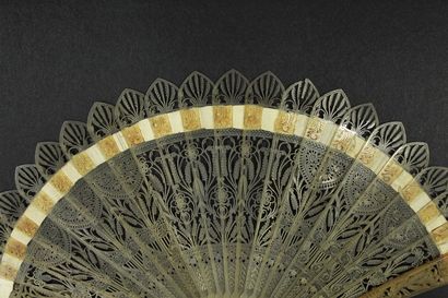 null Two fans, circa 1820

*One of the broken type in blond horn finely cut of flowers...