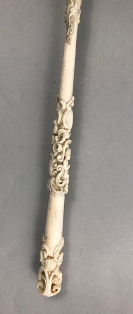 null 
Umbrella, circa 1890





Rich articulated ivory* handle carved with love among...