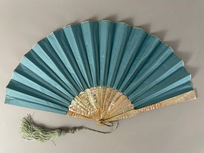 null Two embroidered fans, circa 1880-1890

*One, a sky blue satin leaf embroidered...