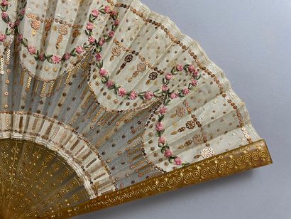 null Ribbon roses, circa 1900-1920

Small fan, the silk leaf sewn with golden sequins,...