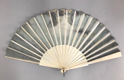 null Two fans, late 19th century

*One, the black satin leaf painted with a Chinese-inspired...