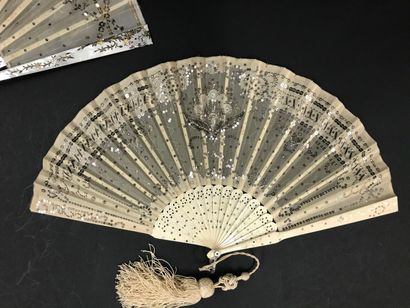 null Two fans, circa 1900

*One, the leaf embroidered with a braid of laurels in...