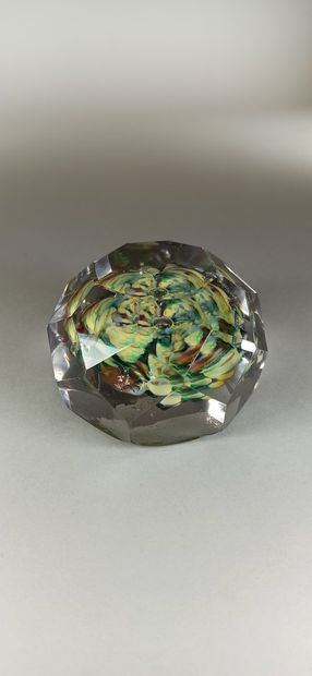 null Two paperweights:

- the first with a crown decoration of twelve blue, yellow,...