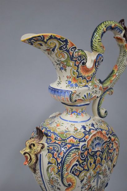 null Large ewer in polychrome earthenware from Desvres with a rich "Rouen" decoration...