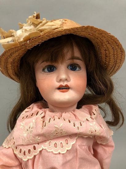 null French doll, with bisque head, closed mouth, damaged and restored, marked "R.D"...