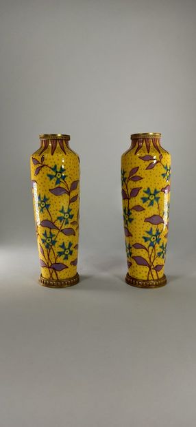 null SEVRES

Pair of small porcelain vases with yellow background and floral decoration,...