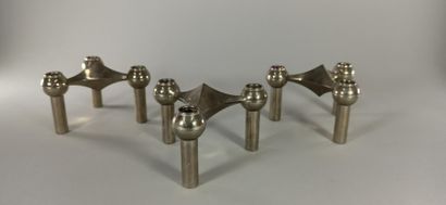 null 
NAGEL 

Three adjustable tripod candleholders in chromed metal. We join a third...