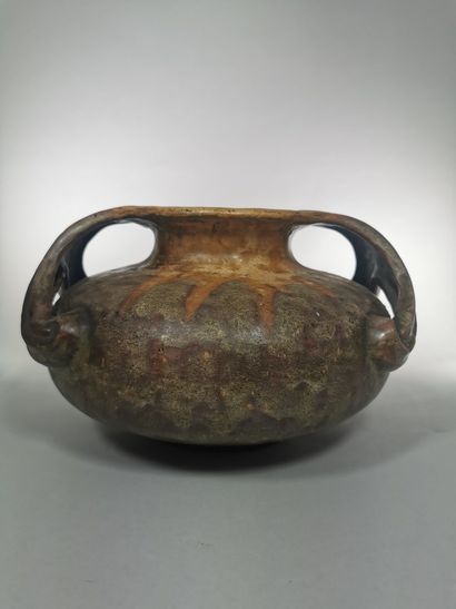 
Stoneware vase has a DEVRES mark on the...