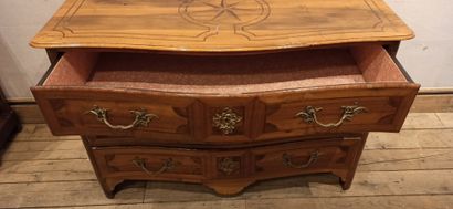 null Fruitwood chest of drawers with three drawers on the front, inlaid with island...